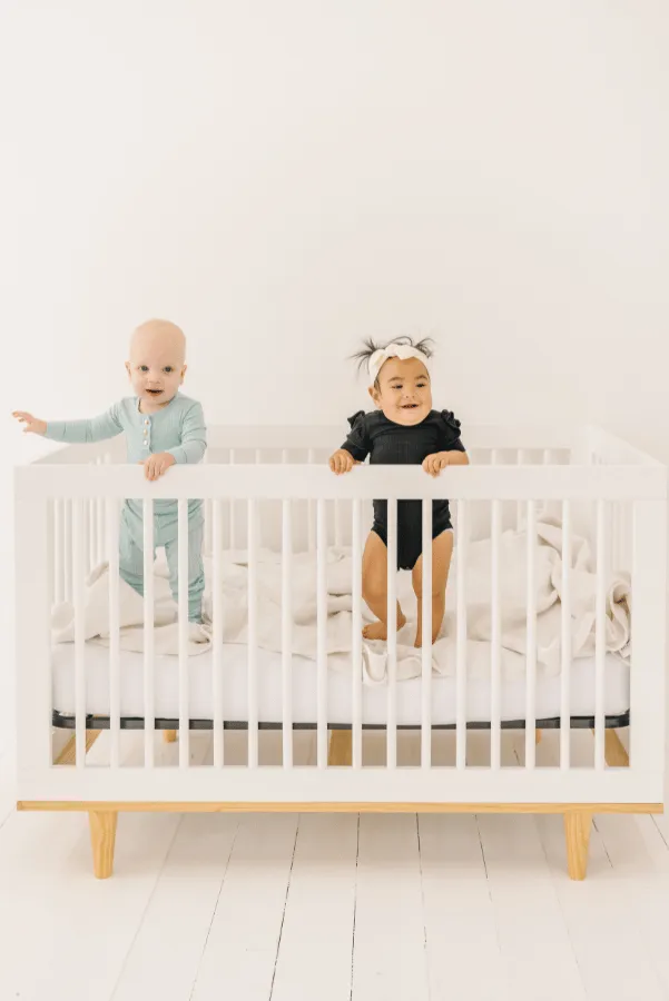 Black Ruffle Sleeve Ribbed Onesie