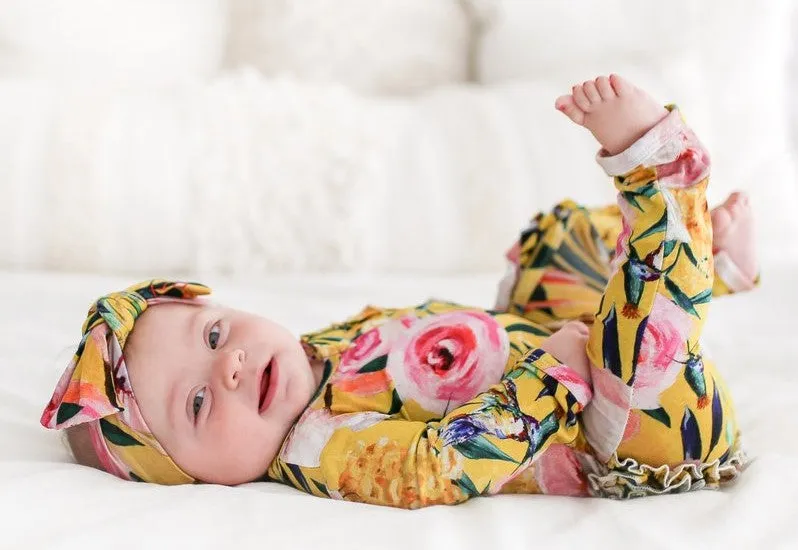 Posh Peanut Tuscan Yellow Floral Ruffle Zippered LS One Piece Ruffle Romper