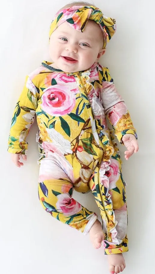 Posh Peanut Tuscan Yellow Floral Ruffle Zippered LS One Piece Ruffle Romper